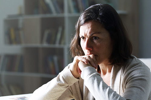 A women experiencing iIrritability in menopause