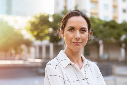 Woman feeling empowered that she knows her bone health risk factors. 